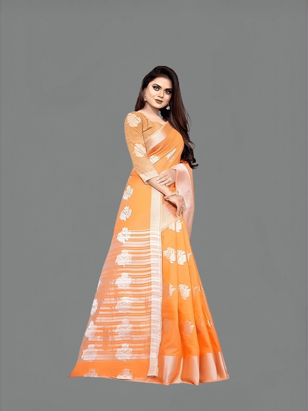 Woman wearing orange cotton silk saree in sunlight - perfect for outdoor weddings