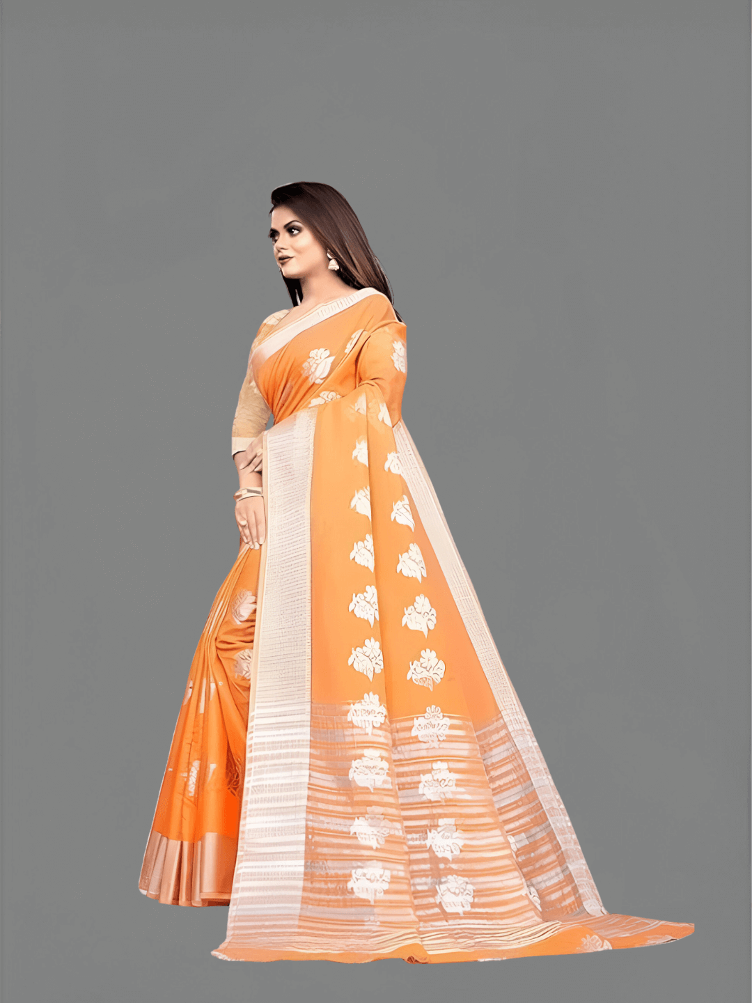 Close-up of intricate gold zari embroidery on orange cotton silk saree border