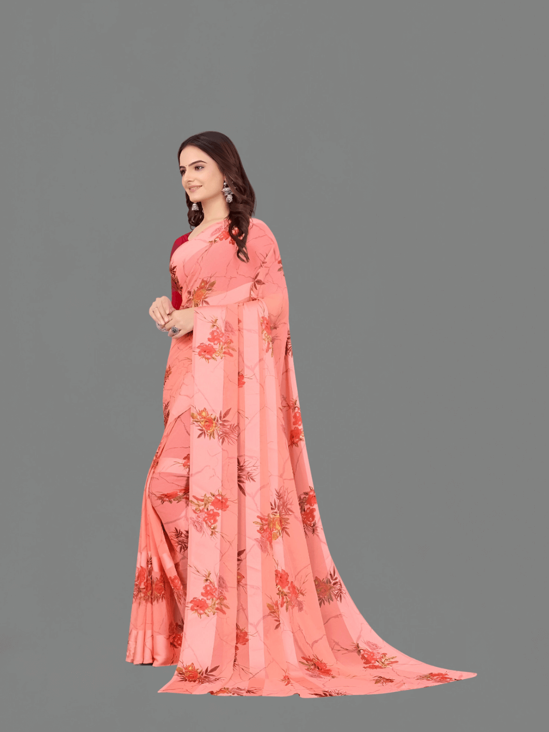 Peach satin patta floral saree glowing in natural light