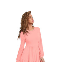 Side angle of Peach Serenade dress against a plain background, displaying its graceful silhouette