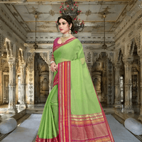 Back angle of pleats, blouse in bright pink balancing the earthy green saree