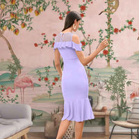 Back view showing sleek silhouette and stretchable fabric