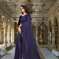 Close-up of premium Lycra fabric with floral cutwork - wrinkle-resistant office wear