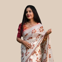 Studio front view of white-orange silk printed saree