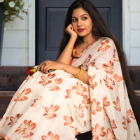 Left profile showing pleats and drape in soft contrast