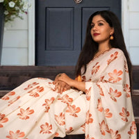 Left profile showing pleats and drape in soft contrast