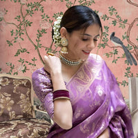 Front view in lavender art silk against royal backdrop