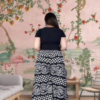 Back silhouette fluttering like a quiet alley breeze