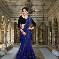 Black blouse paired with navy Vichitra silk saree in elegant contrast frame