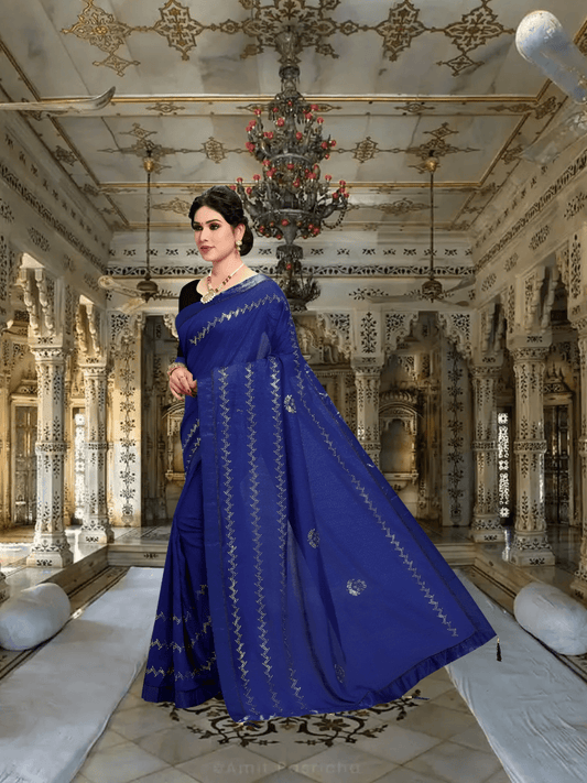 Navy blue Vichitra silk saree with stitched detailing displayed in regal standing pose