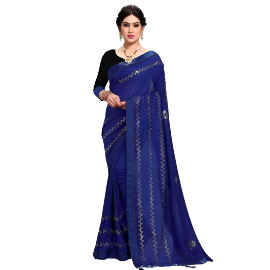 Studio shot of navy Vichitra silk saree showing stitched accents and elegant pleats