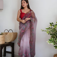 Front angle of wine colored organza saree with floral prints