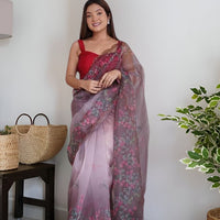 Front angle of wine colored organza saree with floral prints