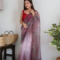 Front angle of wine colored organza saree with floral prints