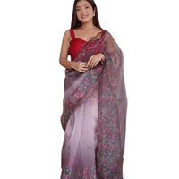 Front angle of wine colored organza saree with floral prints
