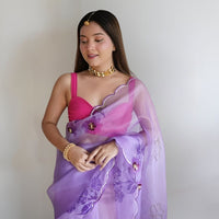 Front view of CELESTINA purple organza saree in royal palace setting
