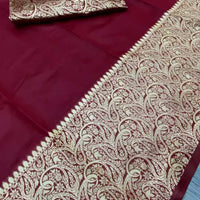 Closeup of fabric showing fine Lichi weave and deep maroon shade – lifestyle background