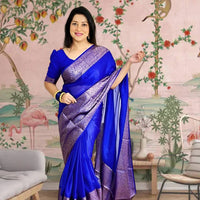 Front view of 💙 Ratnavyatha blue silk saree draped fully – lifestyle background