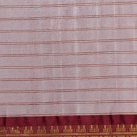 Close-up of pallu showing maroon threadwork and silk blend