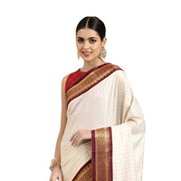 Studio front angle of white checkered saree with defined maroon blouse