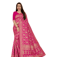 Model in elegant stance, pink saree flowing like devotional verses with golden motifs