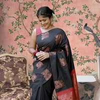  Front view of black-red silk saree in palace setting