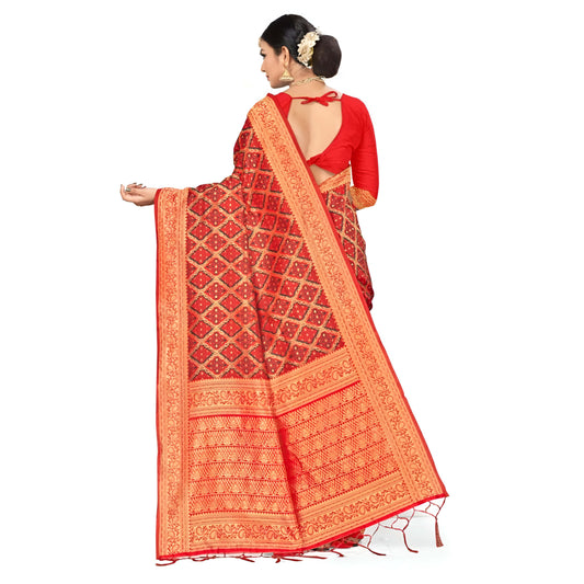 Golden pallu of red saree displayed gracefully in studio