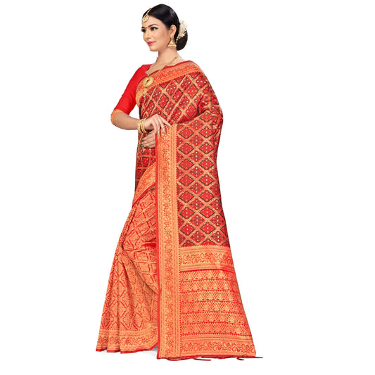 Detailed shot of abstract gold motifs on red Banarasi silk