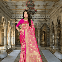 Model in pink Banarasi silk saree with gold motifs inside palace setting