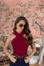  Front view of maroon hosiery T-shirt in elegant setting