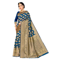 Close-up of antique gold motifs on teal Banarasi saree with studio background