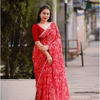 Macro of unconventional abstract prints on red georgette