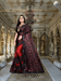Red-black lycra saree in motion, maroon florals glowing 