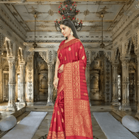 Red Banarasi in wildfire light, gold borders warping like heat mirages