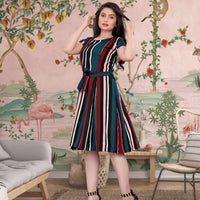  Side view of Celestina's "Scarlet Horizon" Women's Red and Blue Crep Short Sleeve Dress – showcasing its smooth, flowing silhouette.