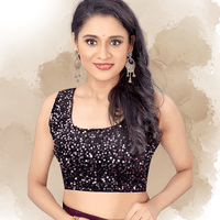 Close-up of glossy satin blouse piece for bordeaux saree