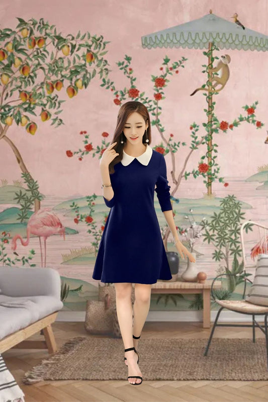 Model in navy dress with white collar in Japanese-inspired set