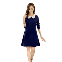 Studio view of navy and white collared dress – front