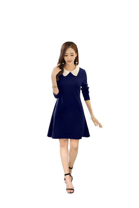 Studio view of navy and white collared dress – front