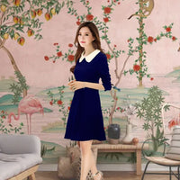 Model mid-walk in soft-lit hallway – cinematic feel