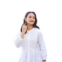  Isolated white tunic front view, crisp band collar standing like a silent sentinel