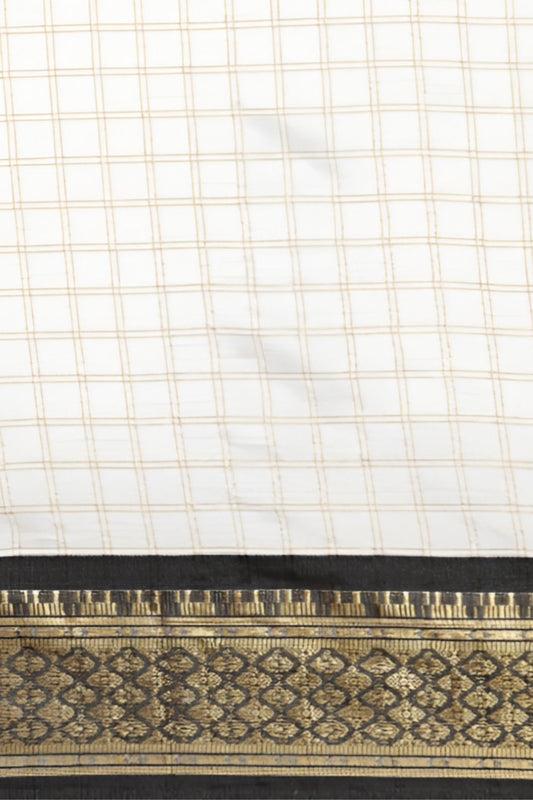 Close-up of the woven fabric with a checkered pattern and a decorative border.