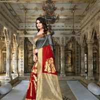 Grey-red saree at twilight, gold border burning like last sunlight