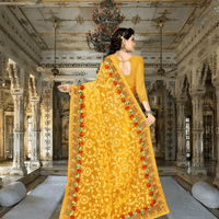 Model mid-step, saree flowing like molten marigold, regal patterns in motion