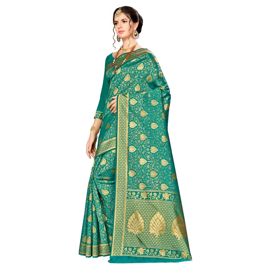 Close-up of gold abstract motif on green silk fabric