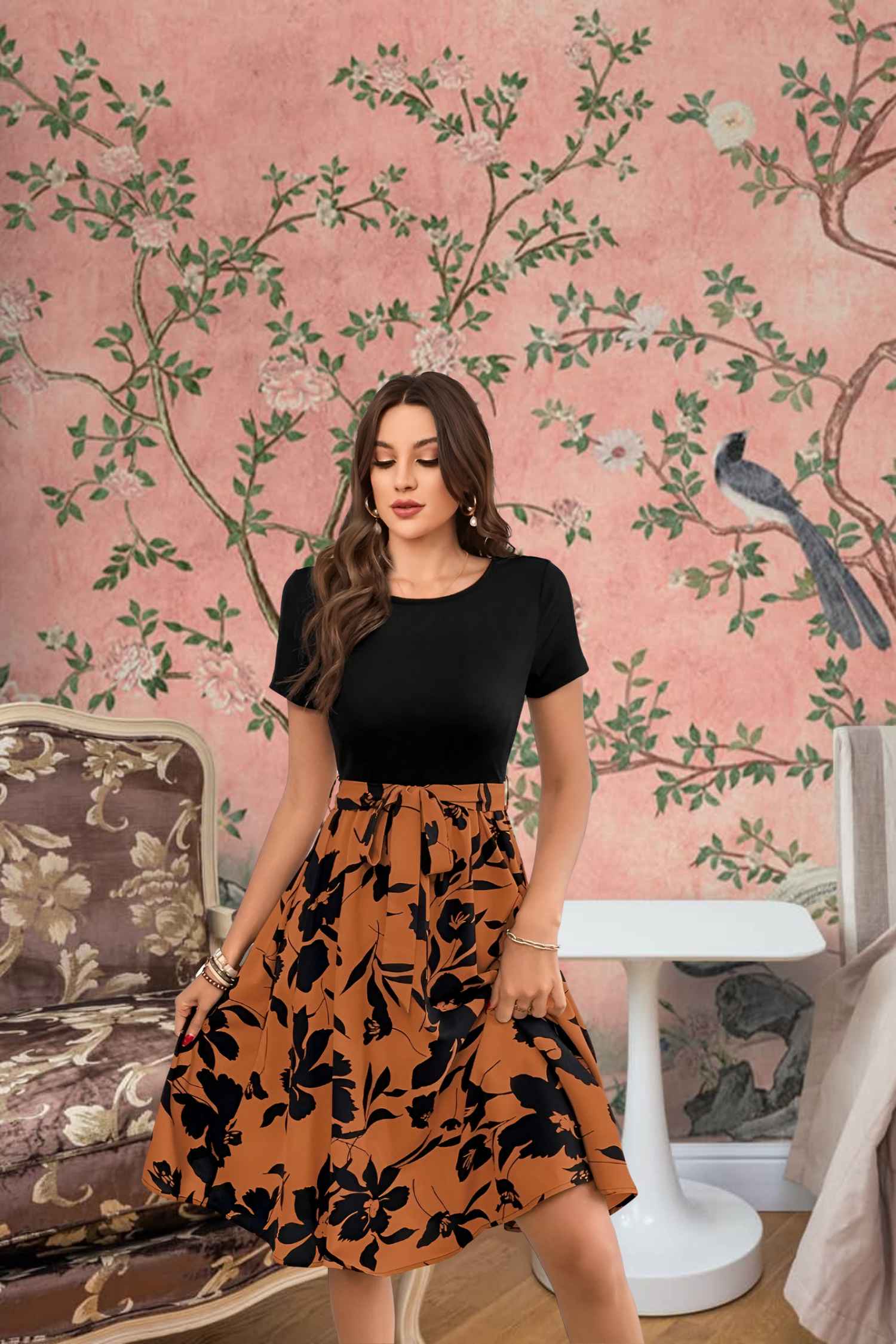Close-up of floral prints on orange skirt