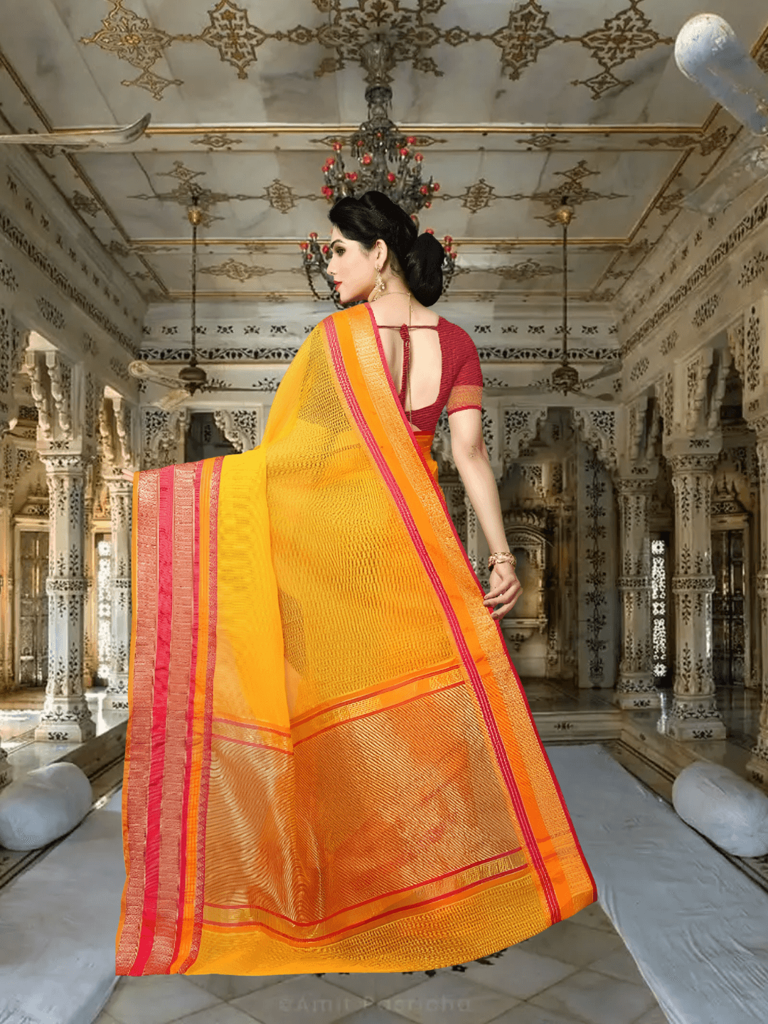 Soft mid-spin motion showing light Kota Doria drape and radiant border