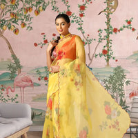 Right side view of sheer yellow saree highlighting texture