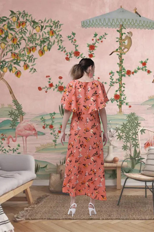 Back view of CELESTINA’s orange floral gown in royal setting