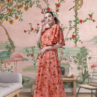  Angled view of orange floral crepe gown for women in palace